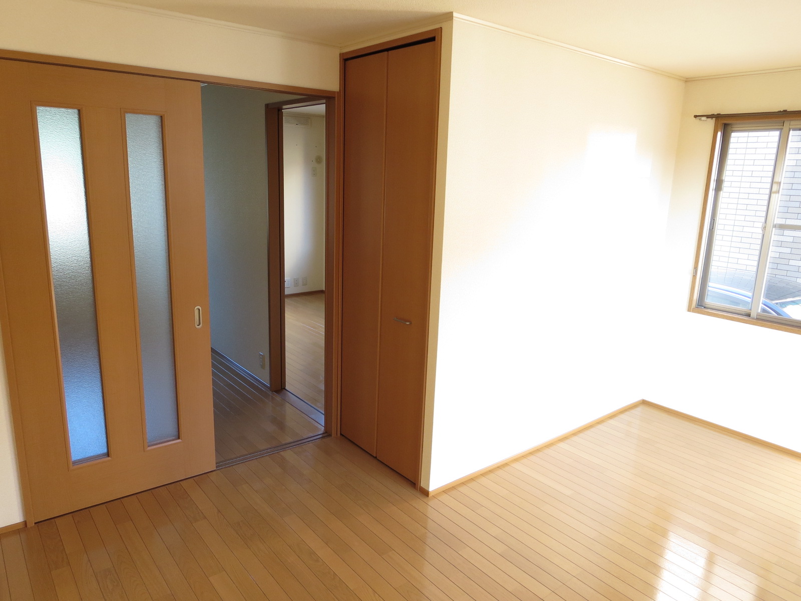Living and room. Woodgrain door of the black set of living