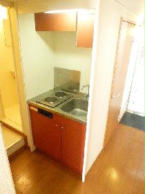 Kitchen. It is an electric stove 2-neck