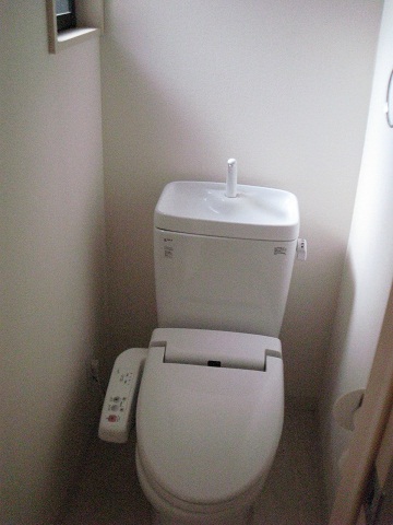 Toilet. Washlet is with