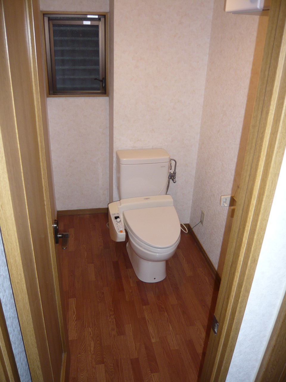 Toilet. Toilet spacious. With hand washing stand. 
