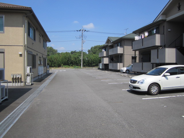 Parking lot. Clear there is a parking lot. 