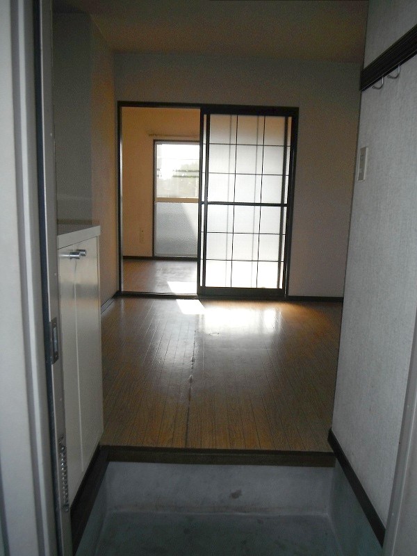 Living and room. It was seen dining from entrance. There are shoe box. 