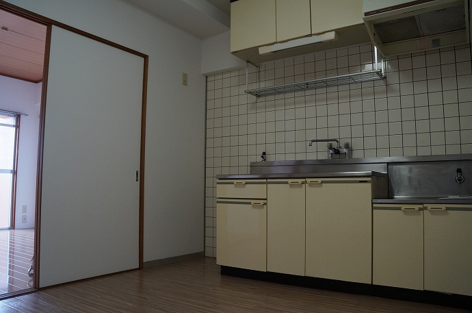 Kitchen. In storage lot with hanging cupboard! 