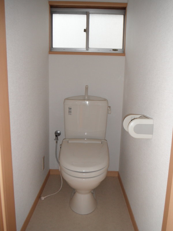 Toilet. There are window.