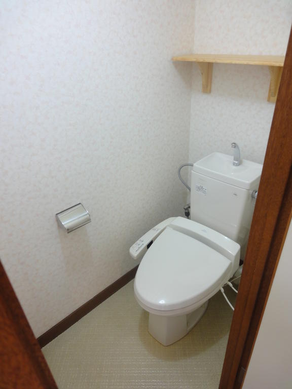 Toilet. Washlet is with