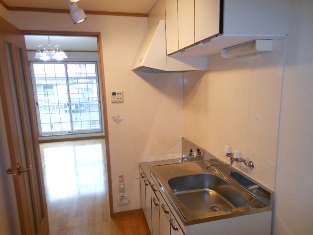 Kitchen. With doors in the not see the room from the front door