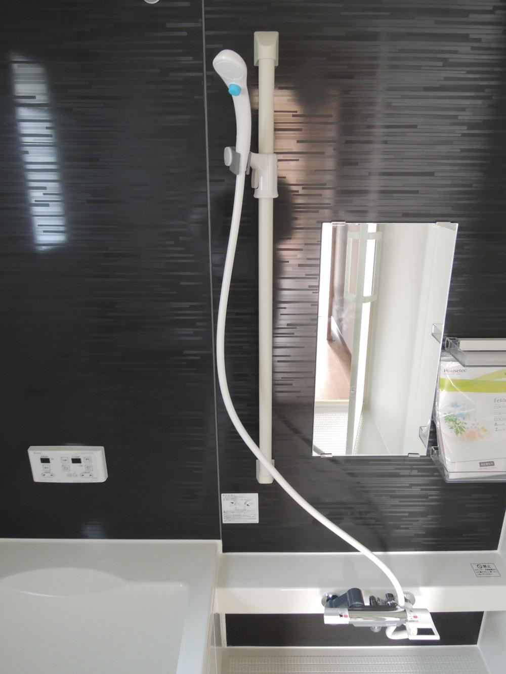 Bathroom. Sliding water-saving shower