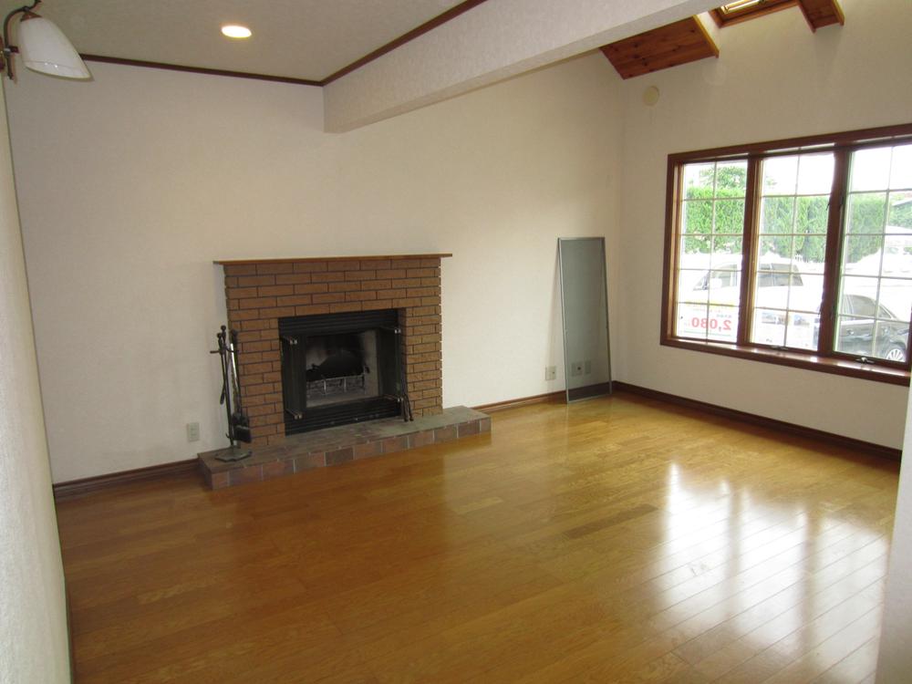 Living. Spacious living room with a fireplace