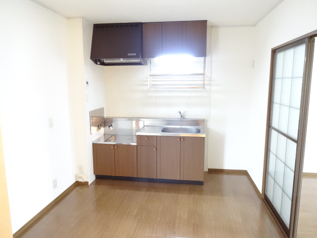 Kitchen. Sink aside which is also visible located outlet in the refrigerator space