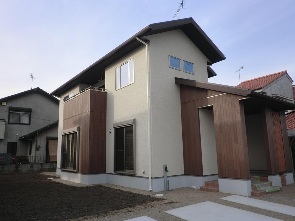 Local appearance photo. Building 2 appearance. Building energy-saving grade 4, Since the outer wall is using a high-performance outer wall dirt runs down in the rain, Beautiful and long-lasting