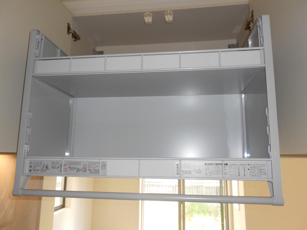 Kitchen. Wall down with storage