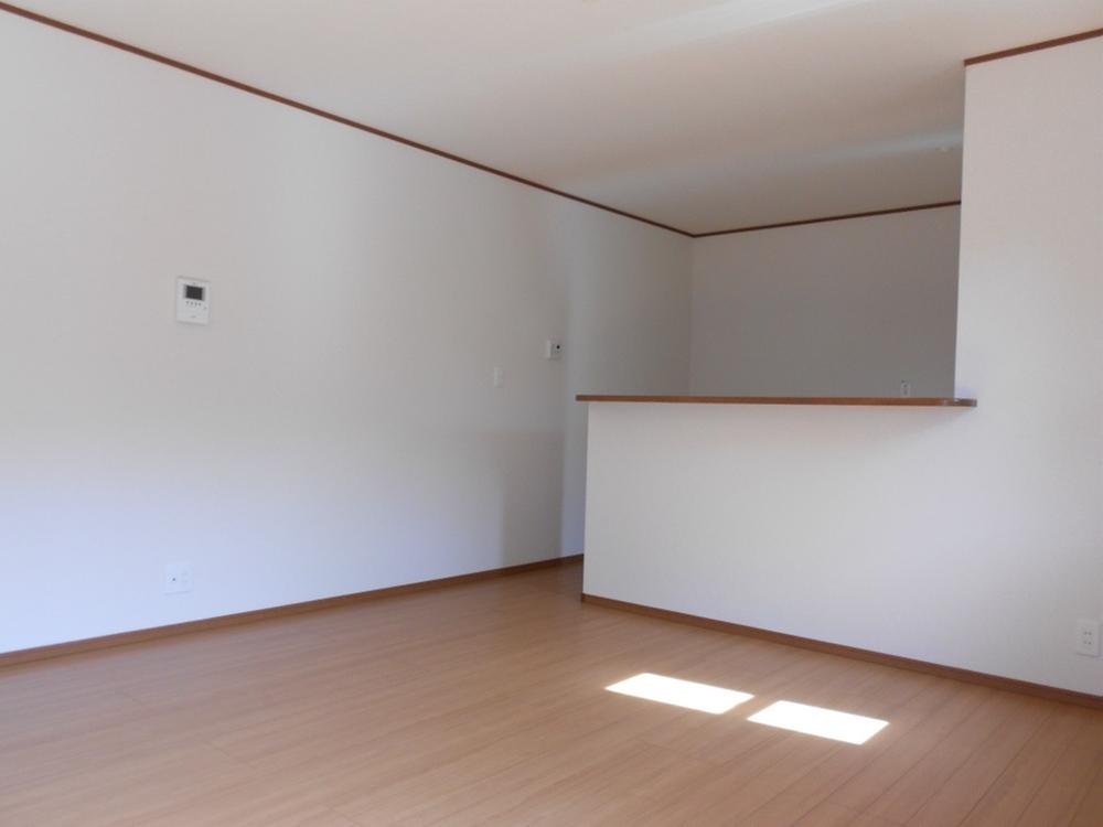 Living. It is very bright and warm living room during the day. 