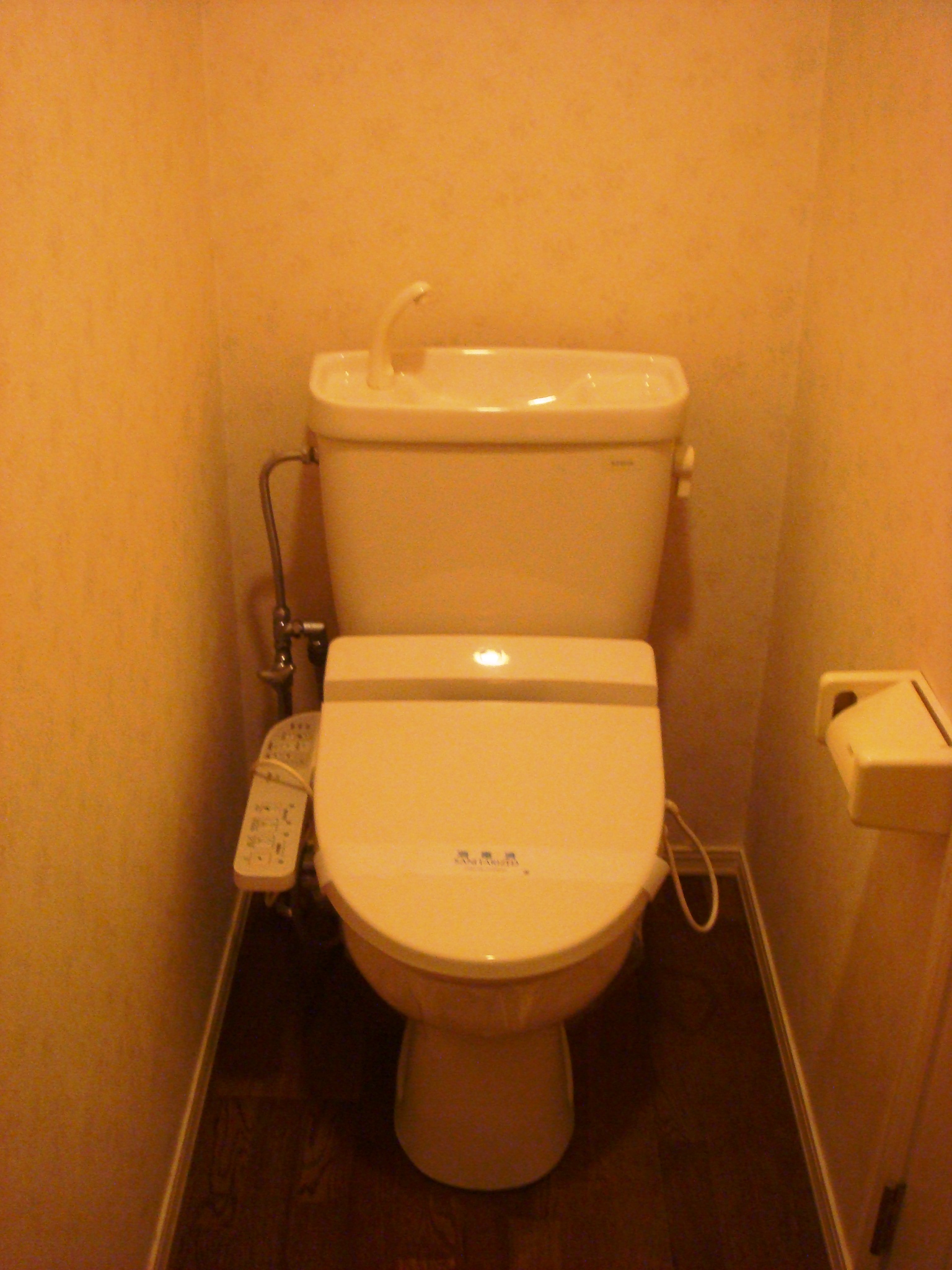 Toilet. Washlet is with