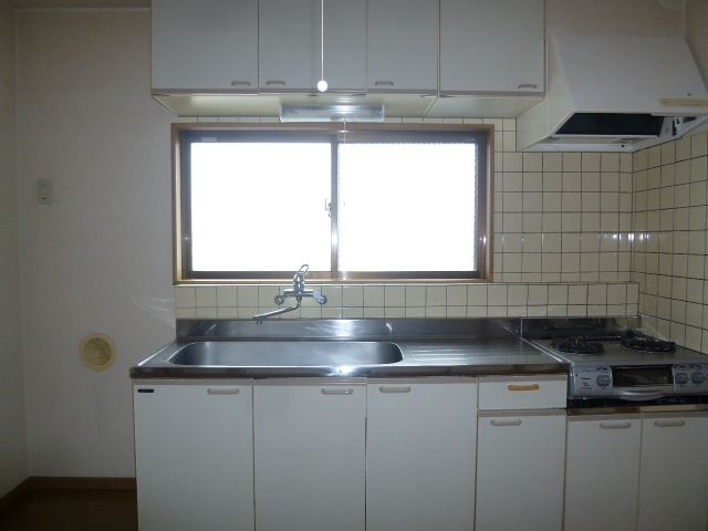 Kitchen. Bright and airy kitchen with a window. 