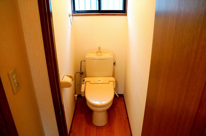 Toilet. With a bidet and a window