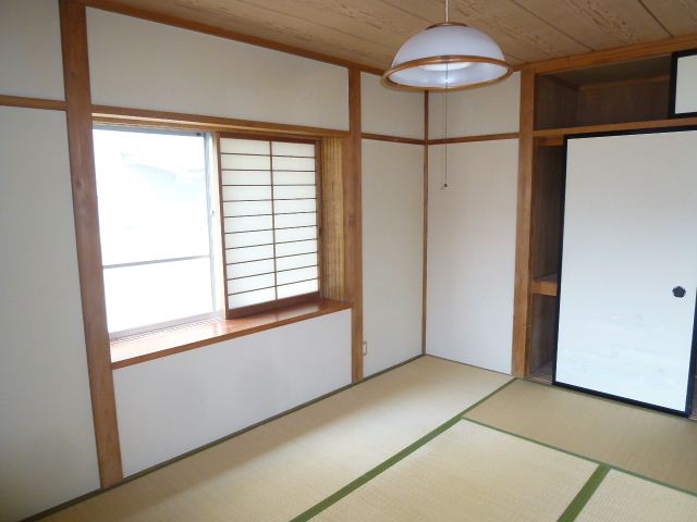 Living and room. A storage and a bay window Japanese-style room