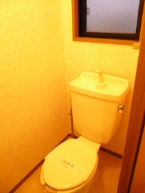 Toilet. There is also a window to the toilet. 