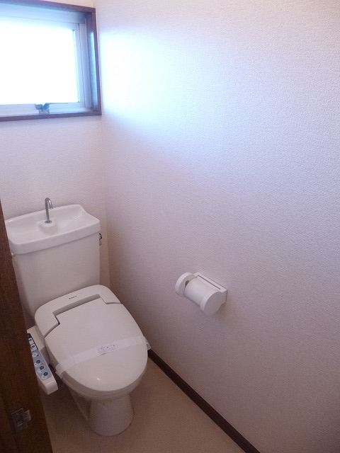 Toilet. With warm water washing toilet seat! 