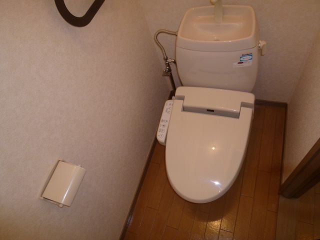 Toilet. Toilet seat is also warm because it is warm toilet