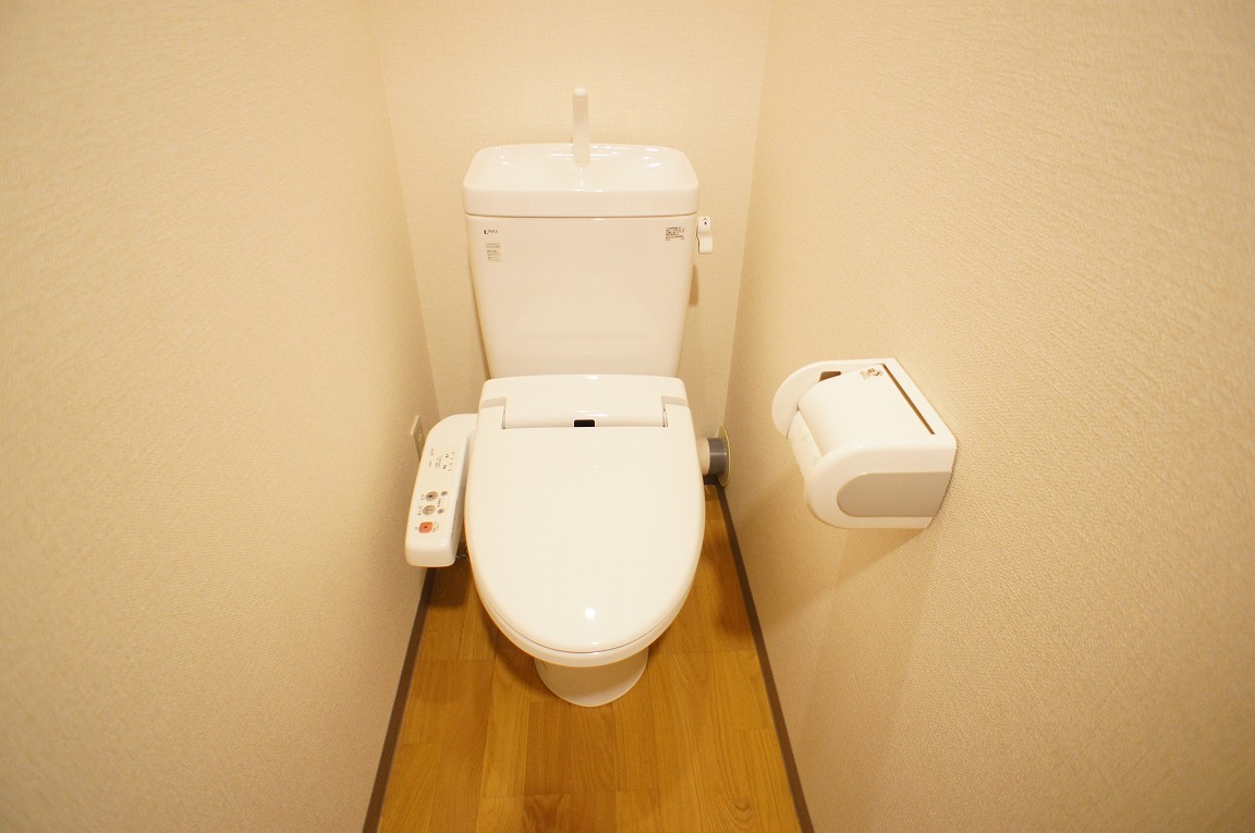 Toilet. It is a warm water washing toilet. 