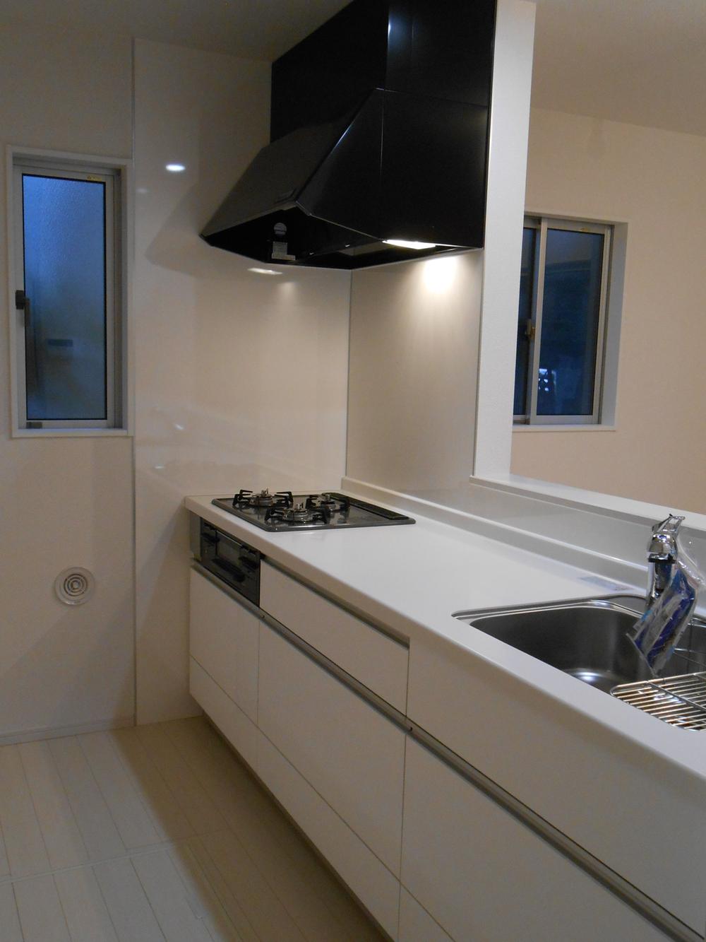 Kitchen. White colors of the kitchen with a clean