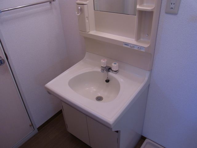 Washroom. With separate wash basin