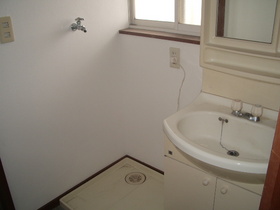 Washroom. Bright wash basin there is a window