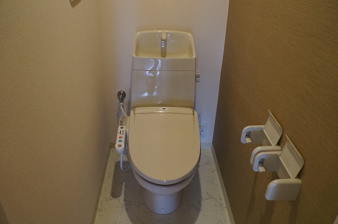 Toilet. Washlet is with