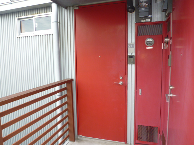 Entrance. Bright red door is impressive