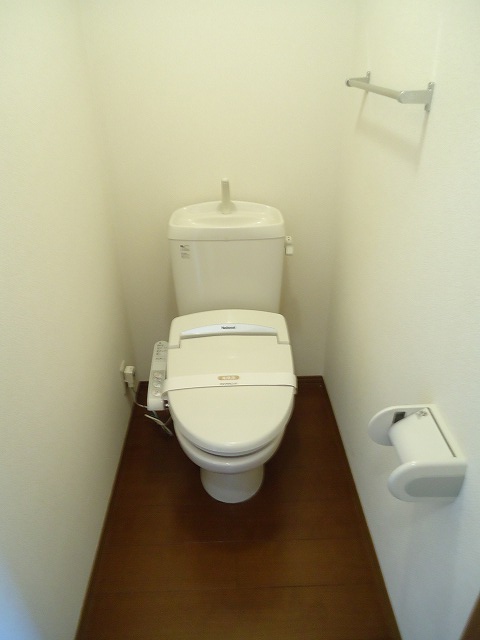 Toilet. Towel with hanger with bidet