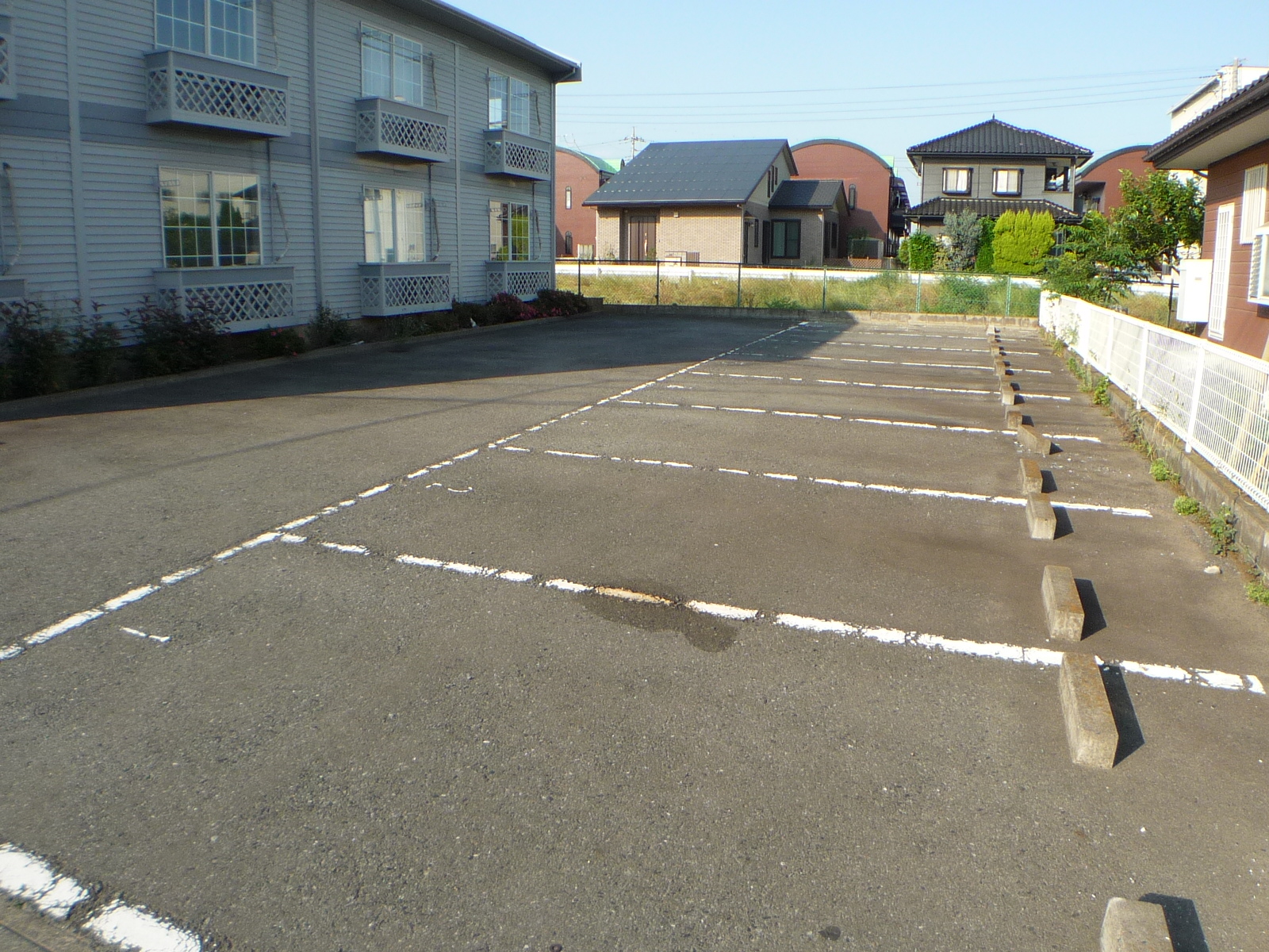 Parking lot. Apartment south has become a parking lot