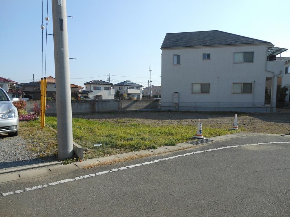 Local land photo. The south side of the property has become a vacant lot