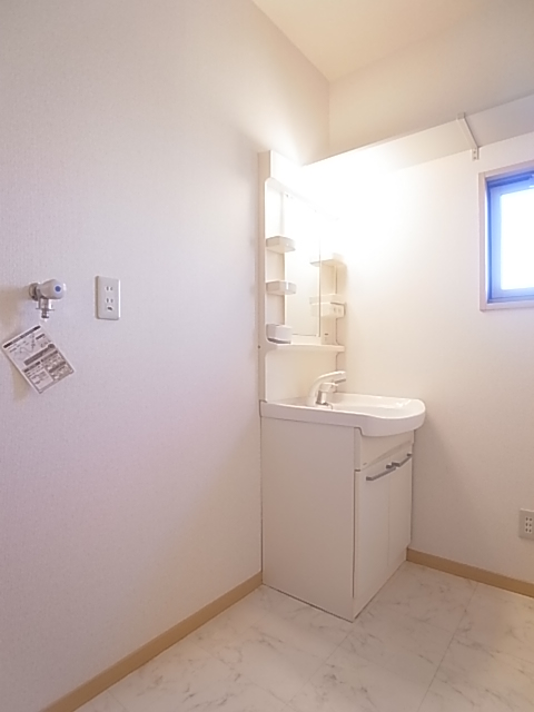 Washroom. Bathroom Vanity, Convenient storage rack to the top