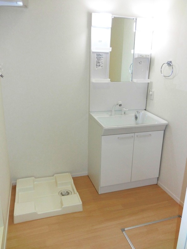 Washroom. Bathroom Vanity ・ Washing machine in the room