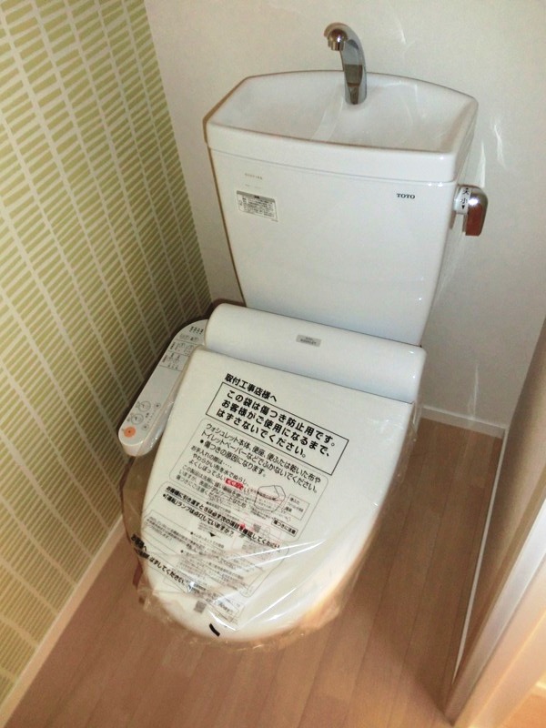 Toilet. Warm water washing toilet seat