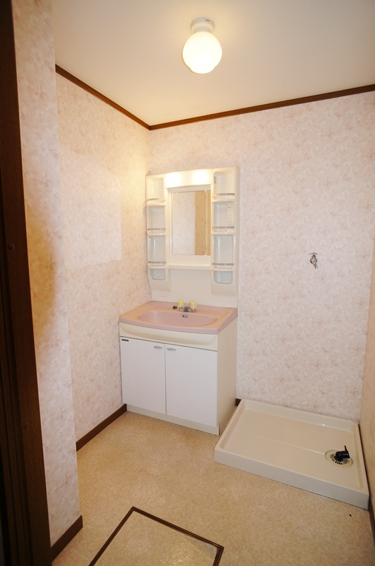 Washroom. It is pale pink washroom