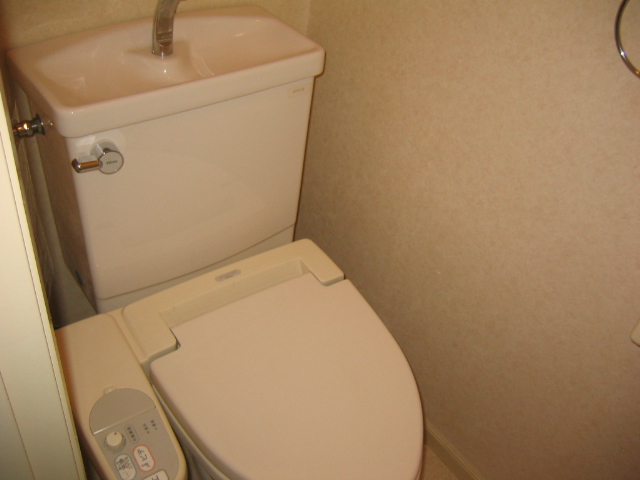Toilet. Warm water washing heating toilet seat equipped