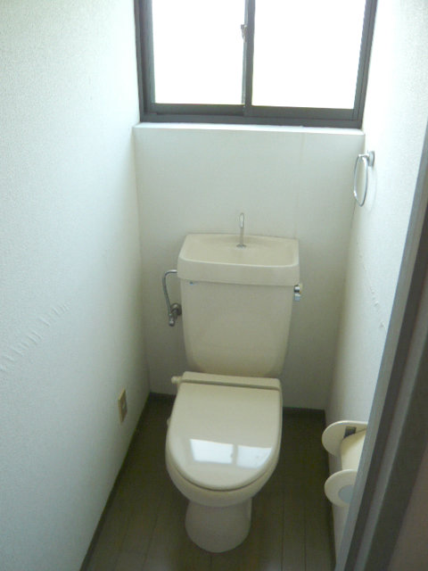 Toilet. Toilet that is not ac- cumulate smell with a window. 