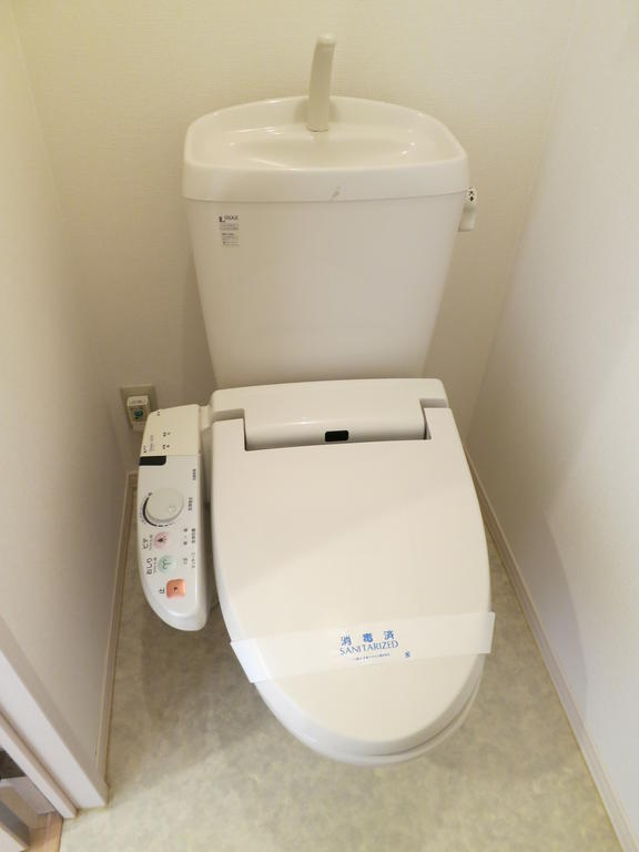 Toilet. Warm water washing toilet seat