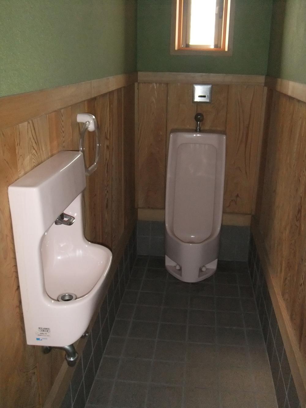 Toilet. First floor men's toilet