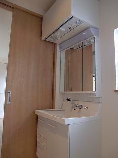 Wash basin, toilet. It is vanity triple mirror type