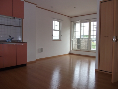 Living and room. For the middle room, It is not attached bay window