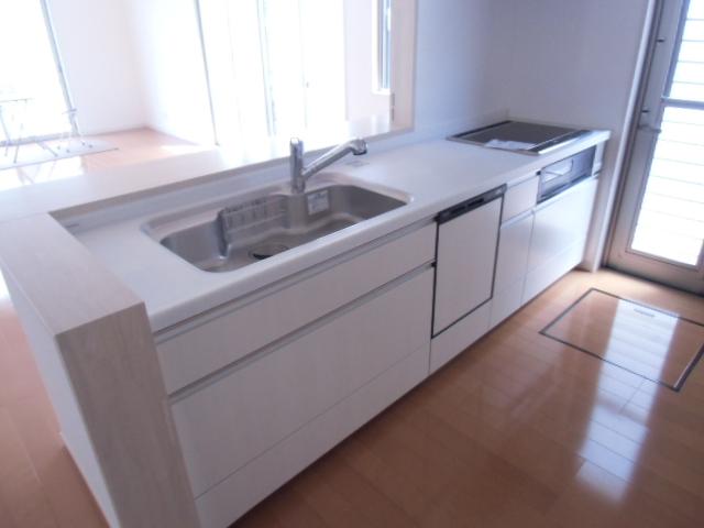 Kitchen. It is with functional floor storage. 