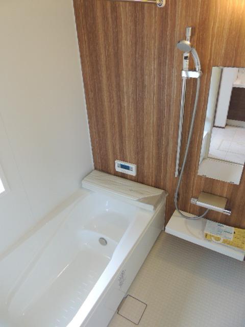 Bathroom. Is worked bathroom accents of wood panel. Such as the floor of the washing place is not cold, Now the bath is up criteria