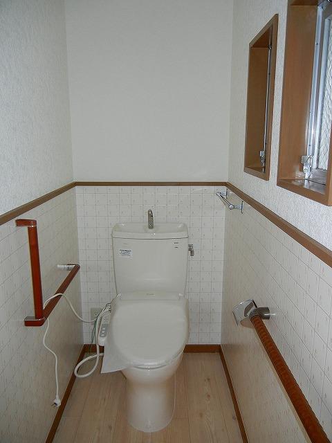 Toilet.   Warm water washing toilet seat