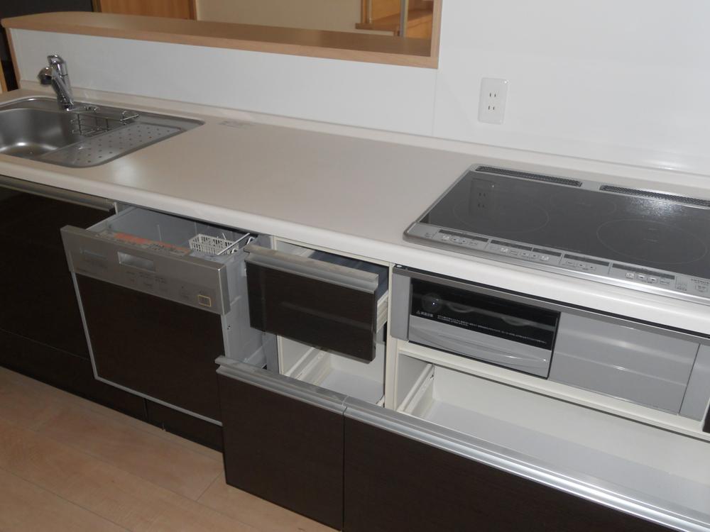 Kitchen. A variety of storage and dishwasher is standard equipment. 