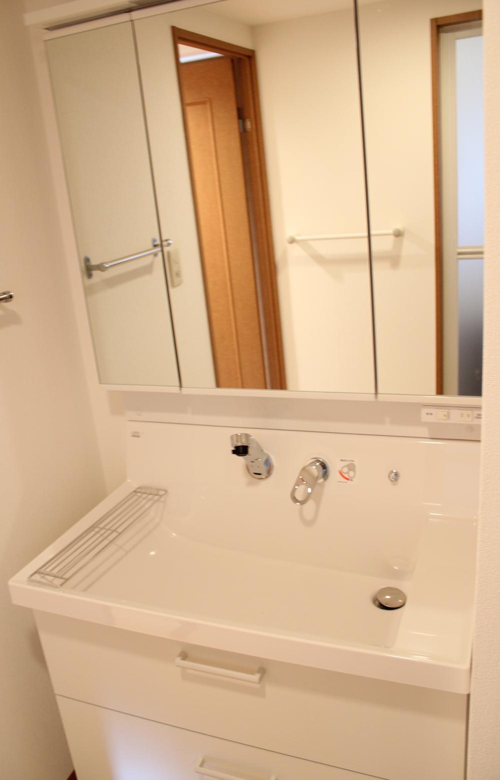 Wash basin, toilet. Local interior
