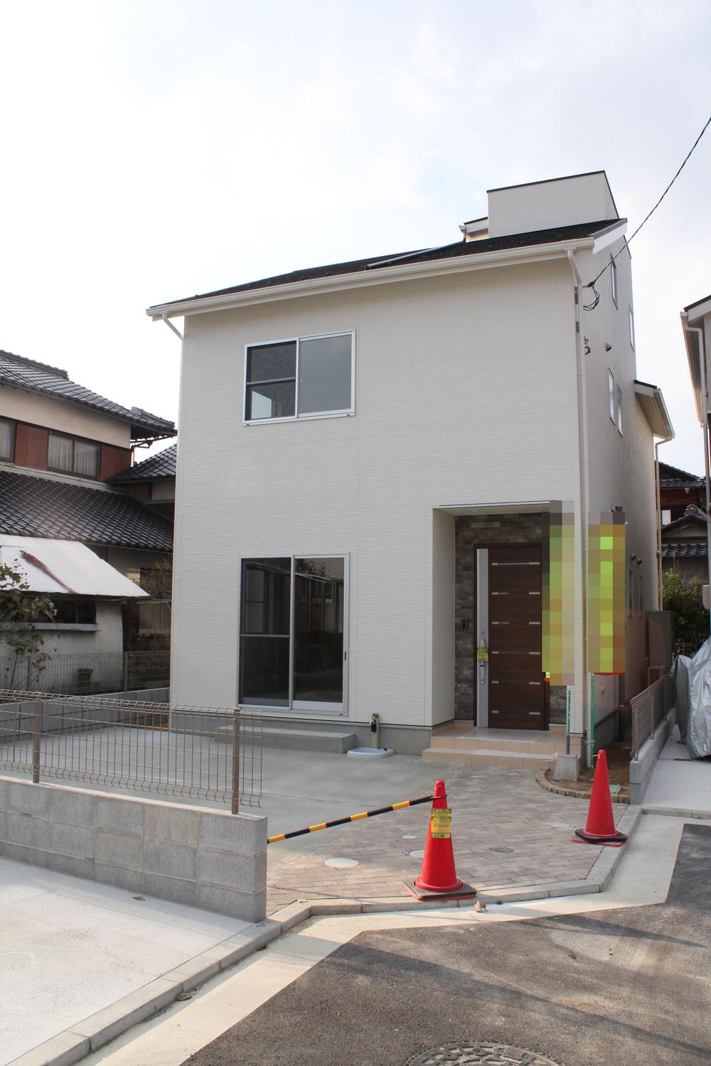 Local appearance photo. Bright single-family new construction. 