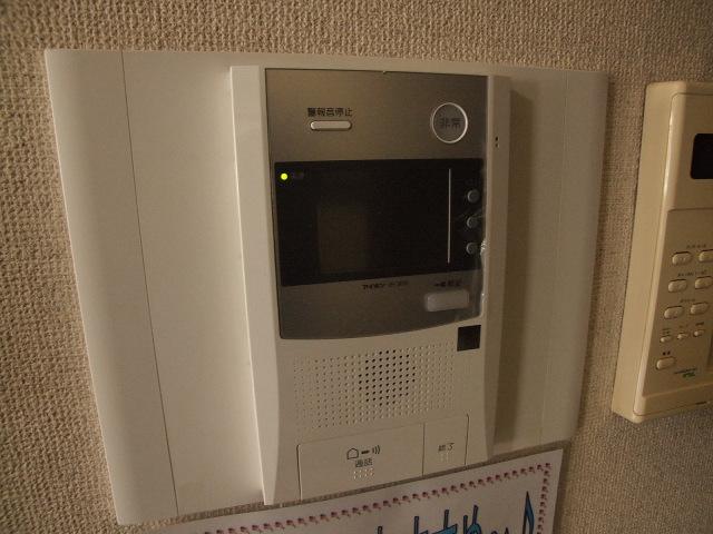 Security equipment. Convenient because intercom is attached to the kitchen next to