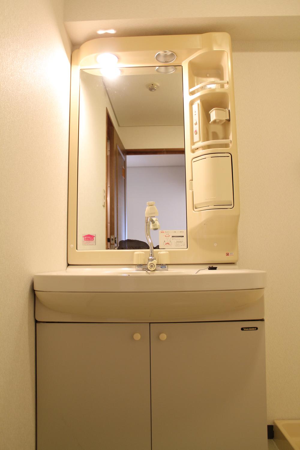 Wash basin, toilet. Indoor photo shadow